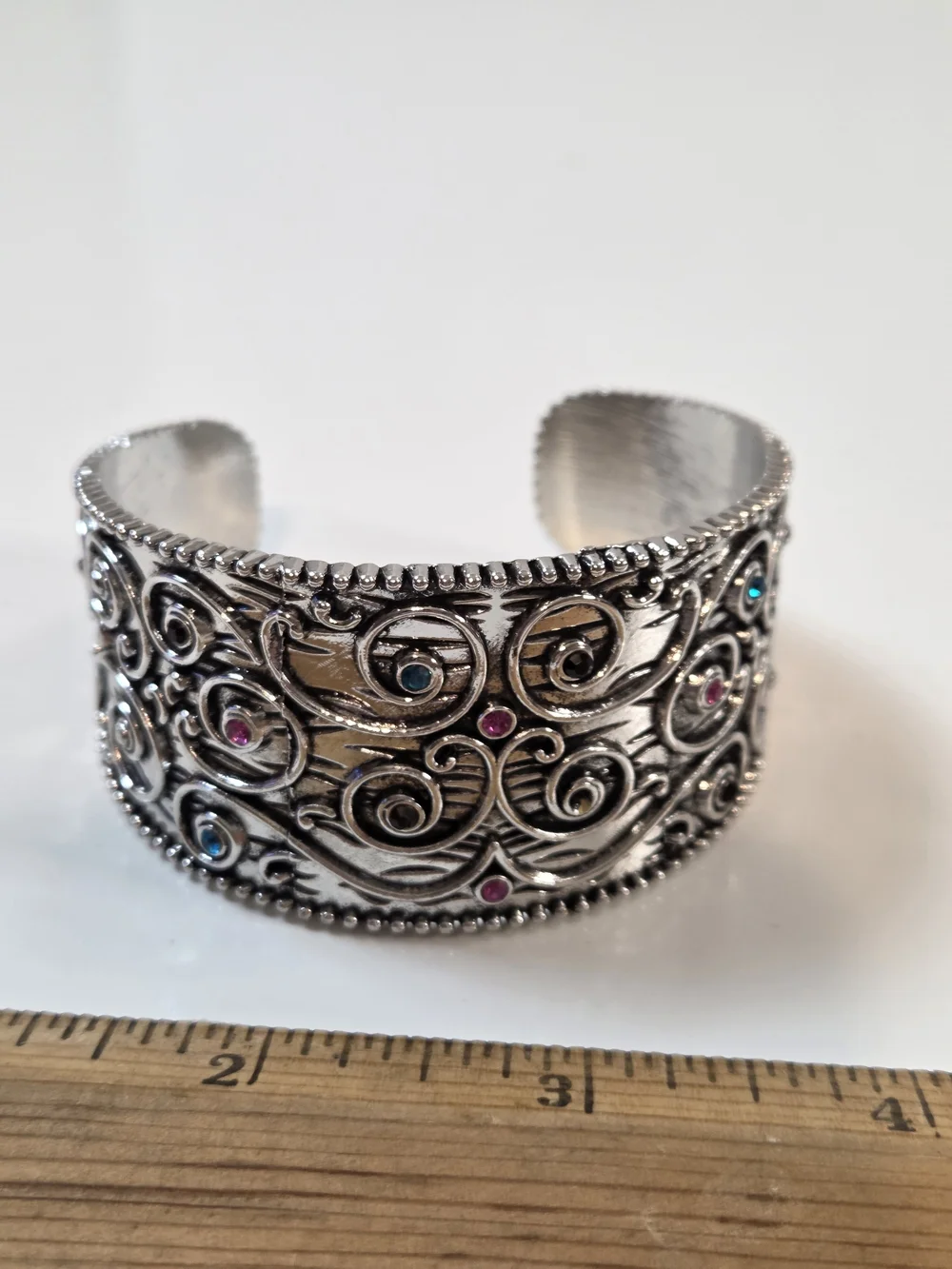Silver Scrollwork Cuff Bracelet with Blue and Pink Stones